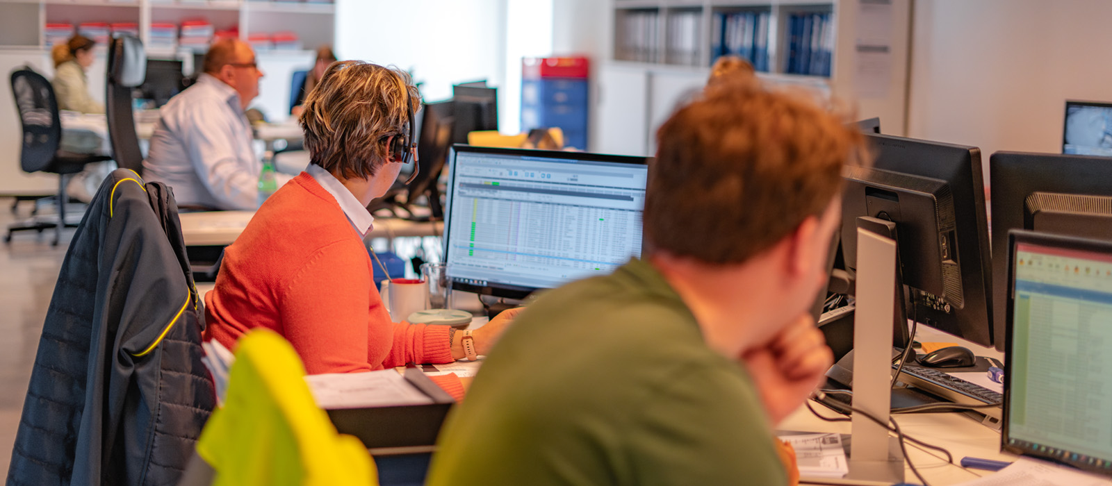 Member of cubecold team working in a busy office